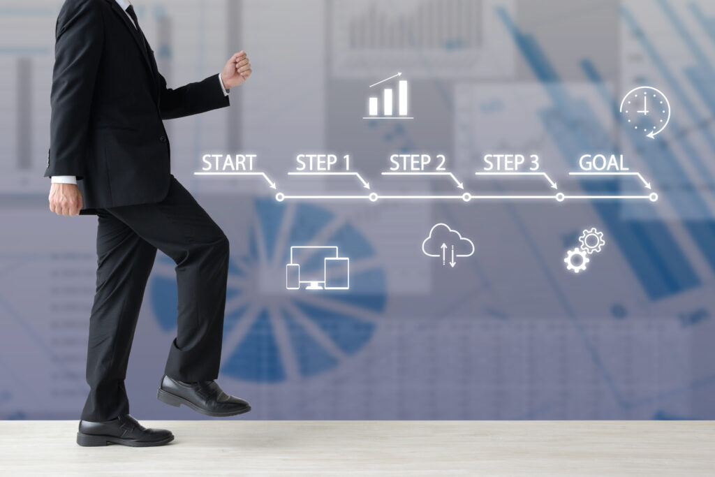 ステップに沿ってスタートからゴールを目指すビジネスマンのイメージ画像 - Semicon.TODAY