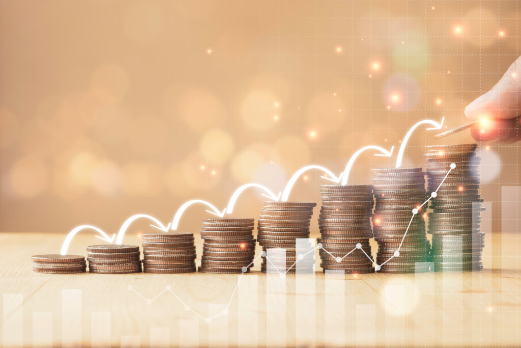 Hand putting coins stacking with infographic arrow jump step for growth business and saving investment concept - Semicon.TODAY