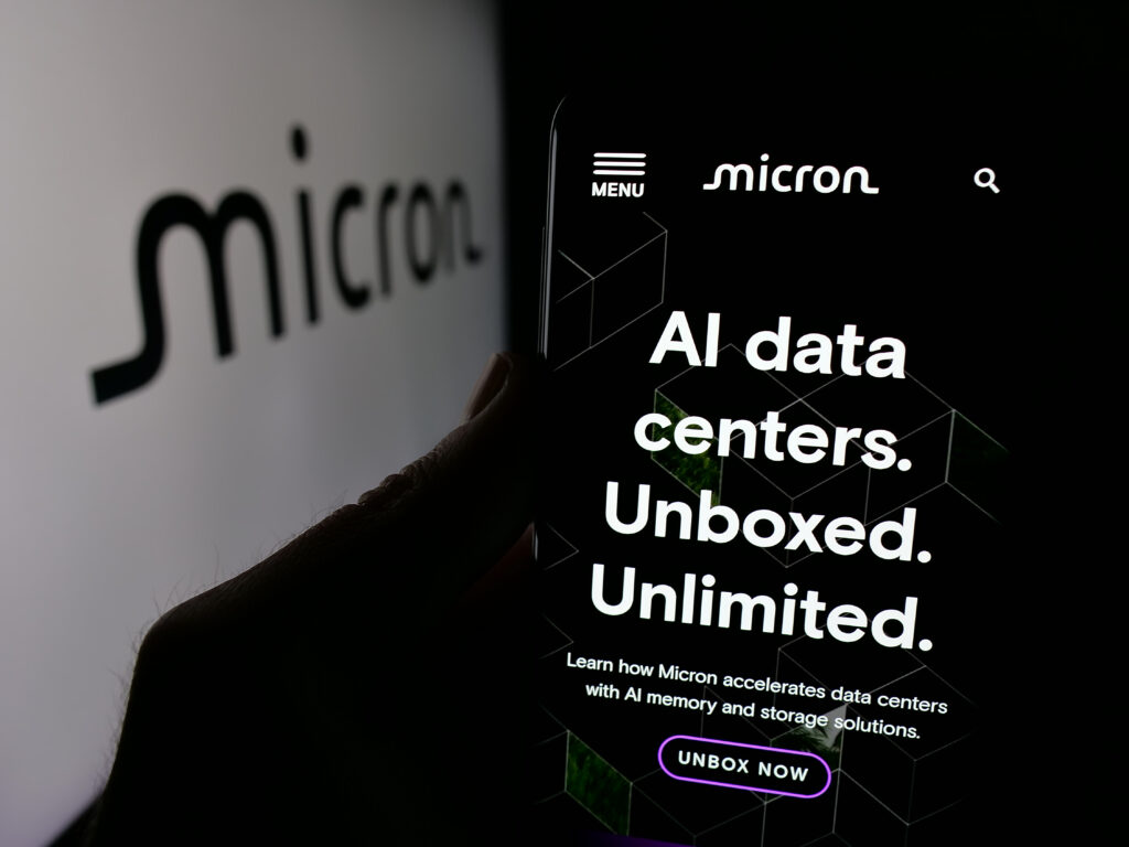 Stuttgart Germany - 01-23-2025 Person holding cellphone with webpage of US semiconductor company Micron Technology Inc on screen with logo Focus on center of phone display - Semicon.TODAY
