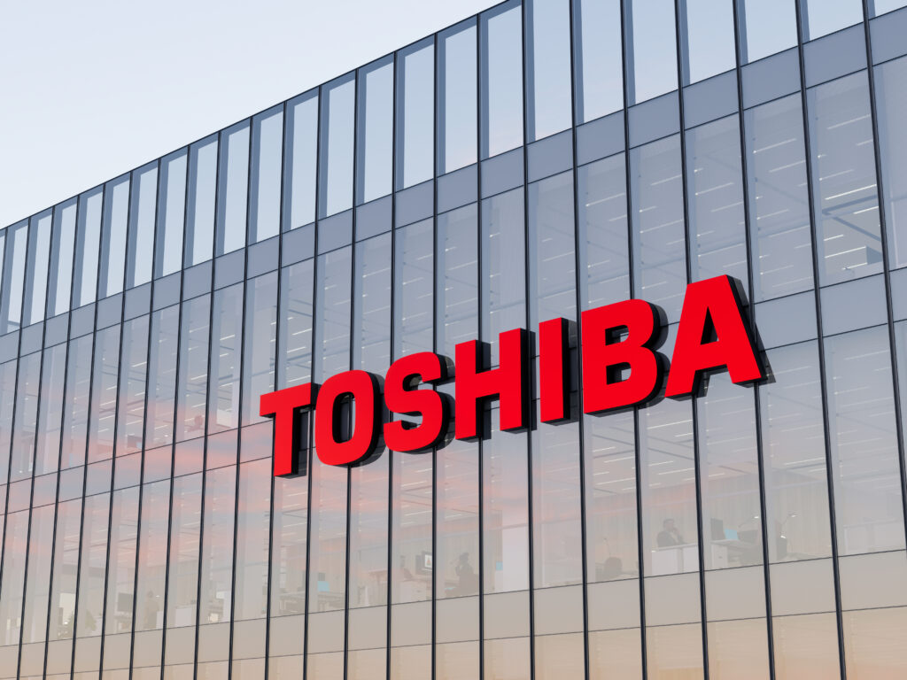 Minato City Tokyo Japan May 2 2022 Editorial Use Only 3D CGI Toshiba Signage Logo on Top of Glass Building Multinational Consumer Electronics Company Office Headquarters - Semicon.TODAY