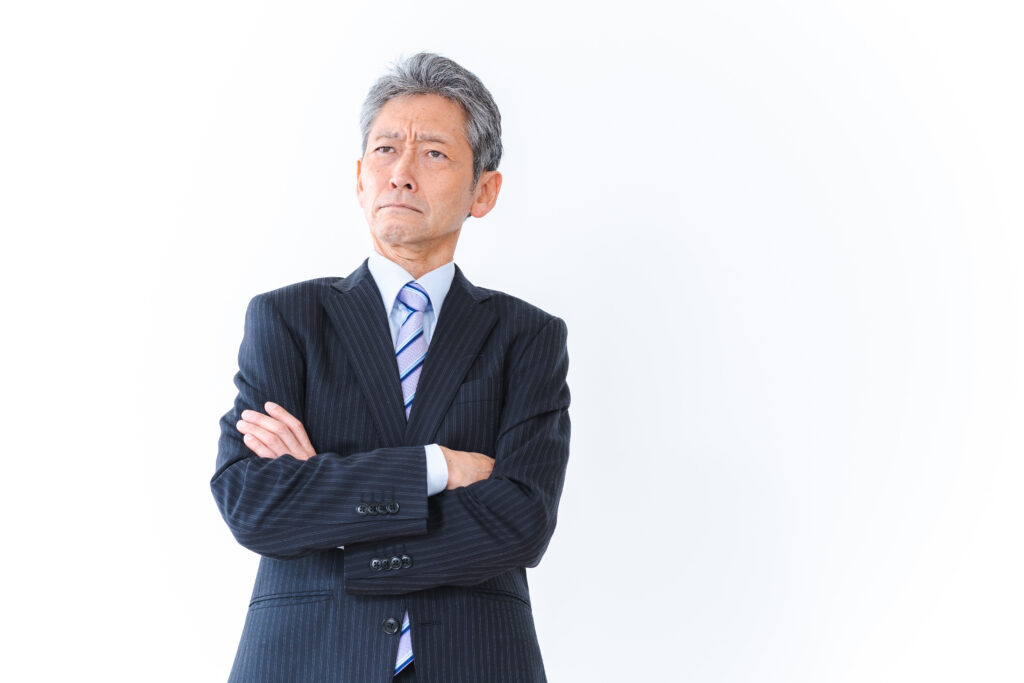 腕を組む会社経営者 - Semicon.TODAY