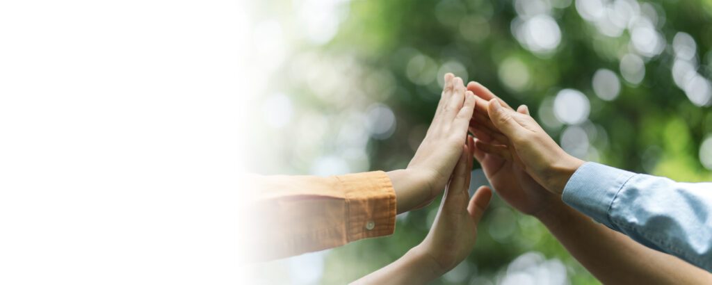 Environmental concept business people join forces on World Environment Day and global community teamwork the global environment society and environment CSR and sustainable development Copy space - Semicon.TODAY