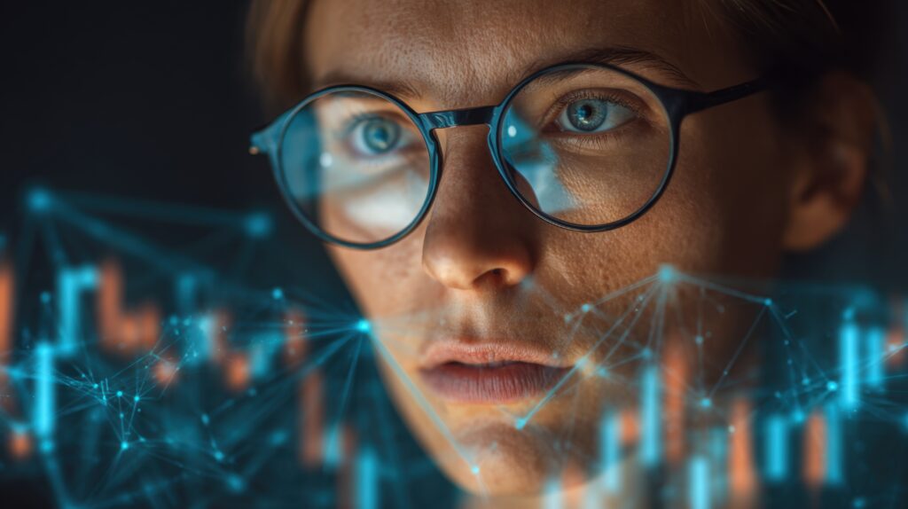 AdobeStock_1952677025 - SEMICON.TODAY Close-up of a person wearing round glasses, looking intently, with blue digital network lines across the scene.